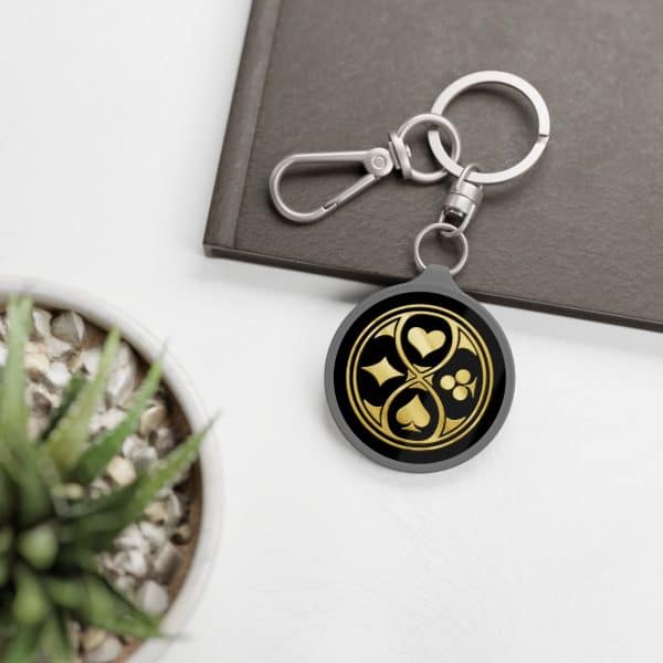 Looking Glass Wars Golden Suit Emblem Keyring Charm