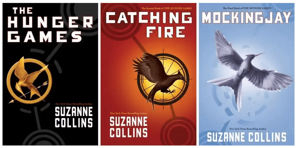 Book Cover for "Hunger Games" by Suzanne Collins. Image features the title and author on a black background with a golden sparrow holding a shield and arrow in an attack formation.