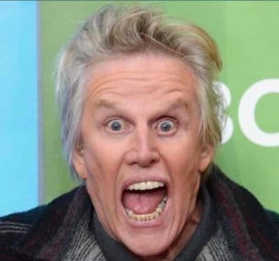 Image of American actor: Gary Busey with his mouth open. Looking crazy as always, he would be a good fit to cast as the Chesire Cat in a remake of the Alice in Wonderland TV movie.