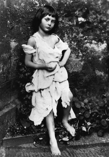 Photograph of Alice Liddell wearing a beggar costume taken by Lewis Carroll in 1858. 