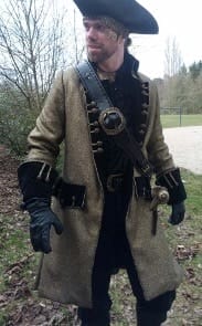 Image of a bearded man dressed in a pirate outfit designed and made by Lenny de Rooy.