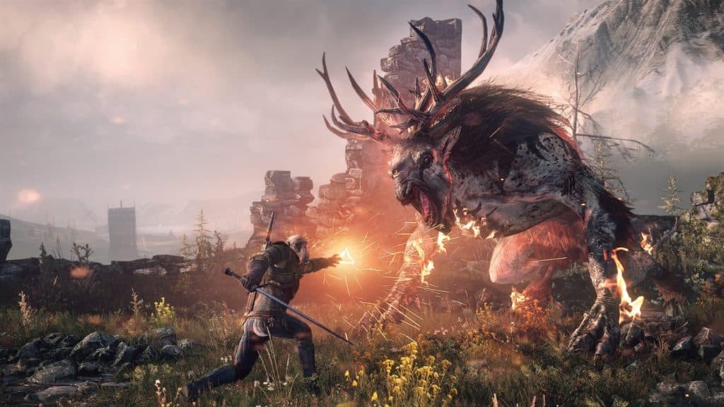 Screenshot from the action role-playing video game "The Witcher 3: Wild Hunt" featuring Geralt of Rivia battling a giant Fiend amongst the ruins of a castle.